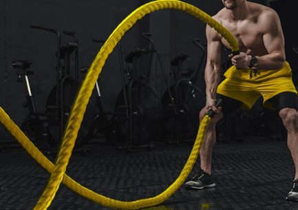 young-athlete-doing-battle-ropes-exercise-at-the-c-TWN7QWL.jpg